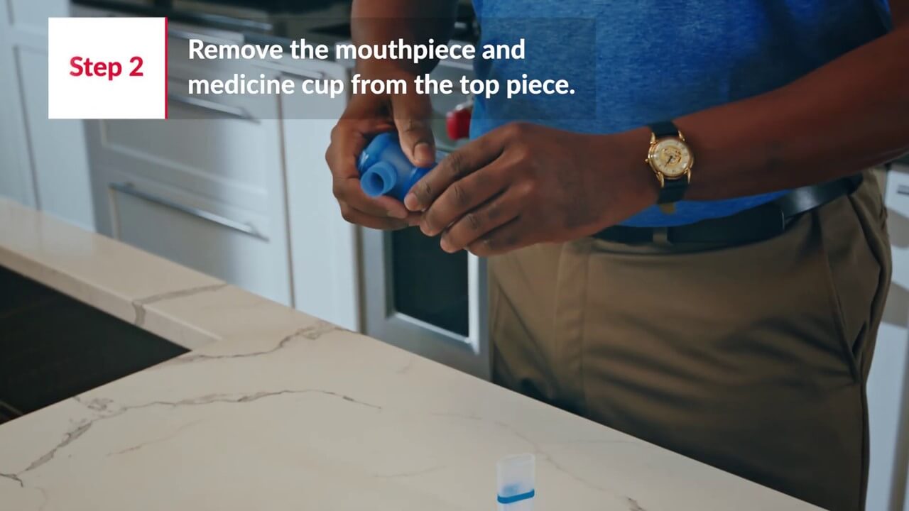 Step2 - Remove the mouthpiece and medicine cup from the top